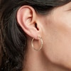 Thumbnail Image 3 of 10K Gold 27mm Diamond-Cut Tube Hoop Earrings