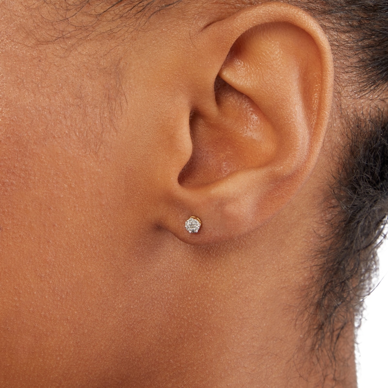 1/15 CT. T.W. Composite Diamond Flower Stud Earrings in 10K Gold